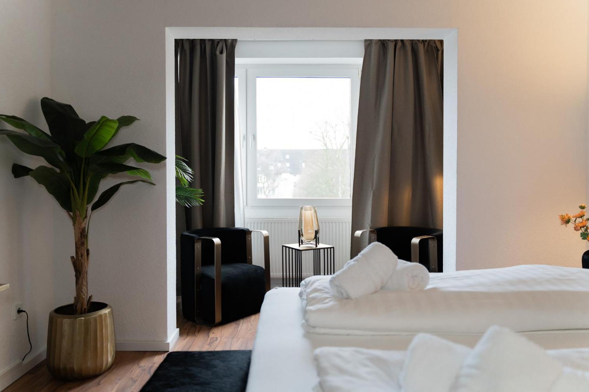 Junik Apartments "Am Sternbuschweg" Дуйсбург Номер фото
